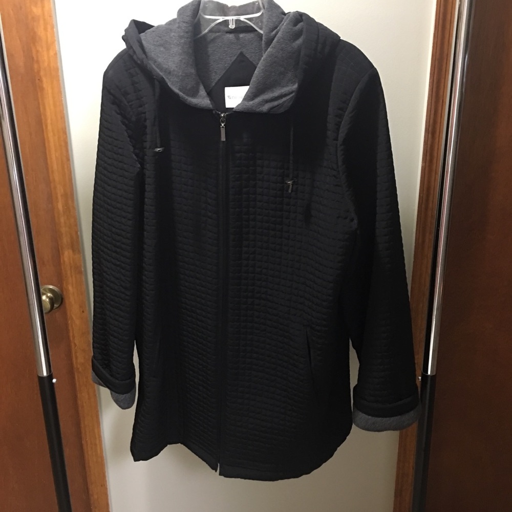 Black quilted jacket with hood and front pockets